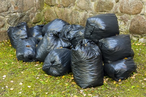 Construction site managing waste with a builders skip