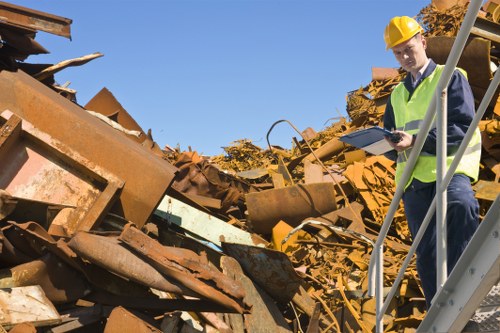 Image of labeled skips placed at a Kentish Town site with clear signage for accessibility