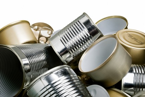 Small skip beside a terraced house in Kentish Town